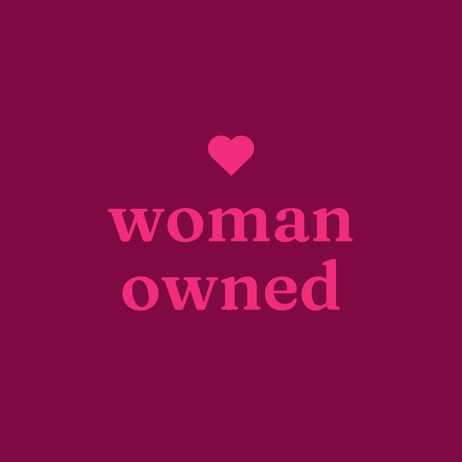 Pink pill-shape containing a white heart and the phrase "woman-owned"