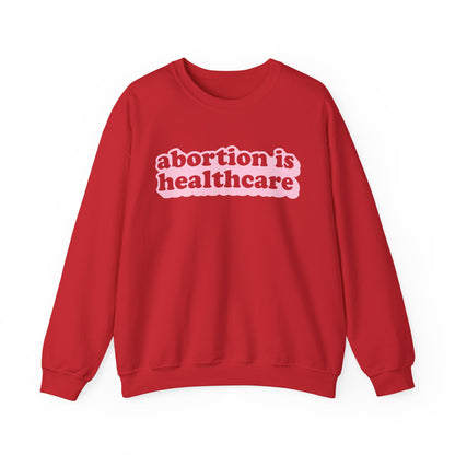 Sweatshirt - Abortion Is Healthcare (Light Pink)