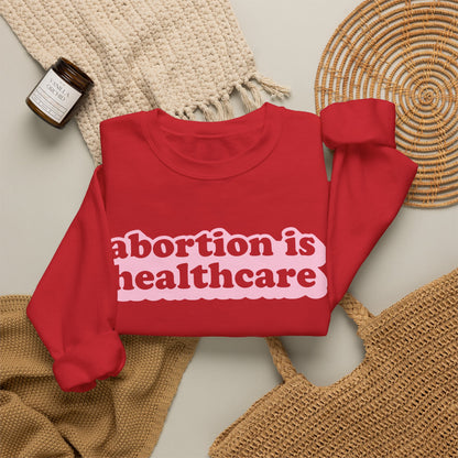 Sweatshirt - Abortion Is Healthcare (Light Pink)