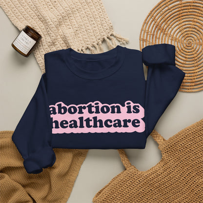 Sweatshirt - Abortion Is Healthcare (Light Pink)
