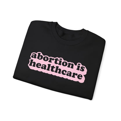 Sweatshirt - Abortion Is Healthcare (Light Pink)