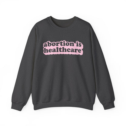 Sweatshirt - Abortion Is Healthcare (Light Pink)
