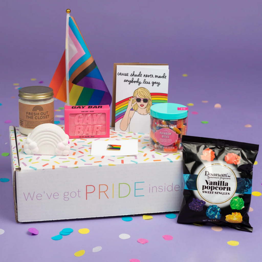 A purple background lends focus to a white box reading "We've got PRIDE inside." The box acts as a stage for an array of PRIDE-themed products.