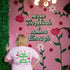 Woman showing off the back view of a tshirt that says "Never Too Much & Always Enough" surrounded by florals 
