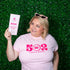 Woman wearing pink tee with "502" in large font with "Louisville Kentucky" written below.