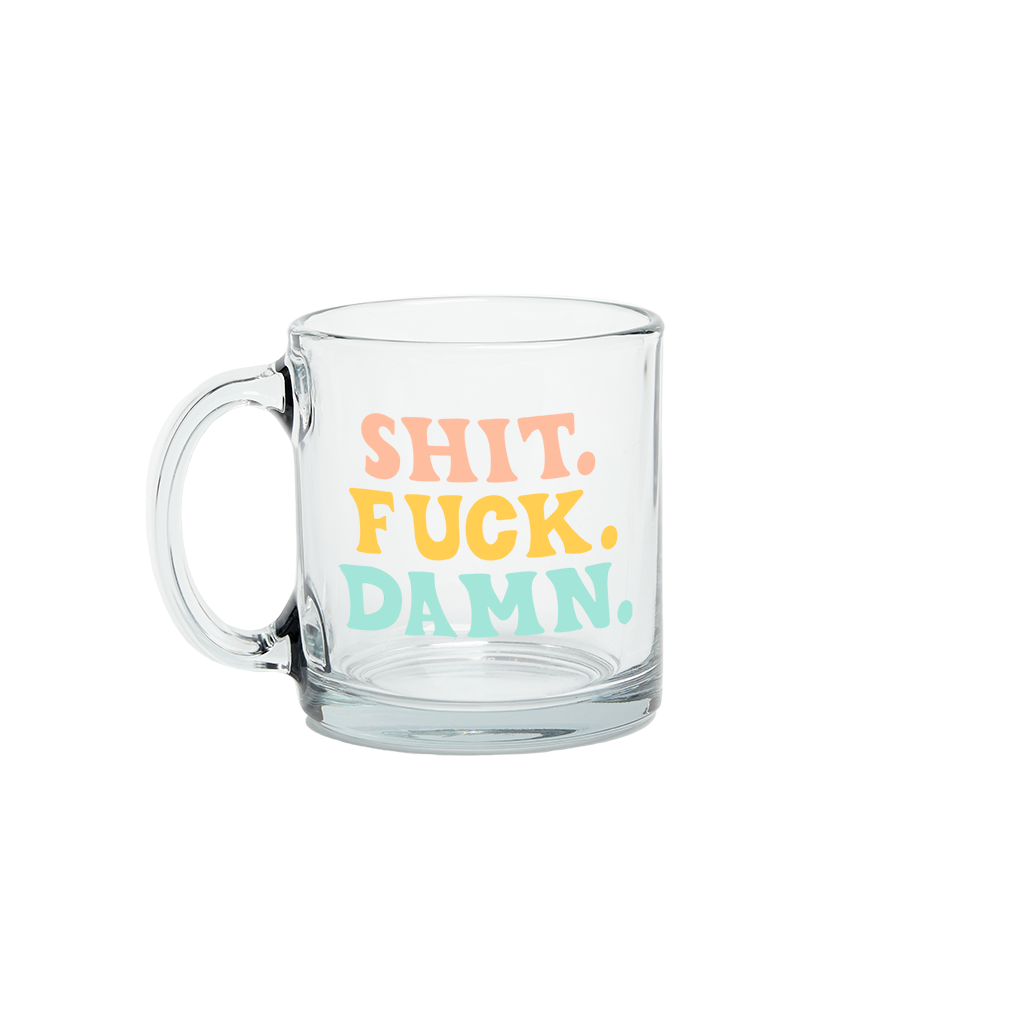 product shot of clear glass mug with the words "fuck shit damn" in different colors