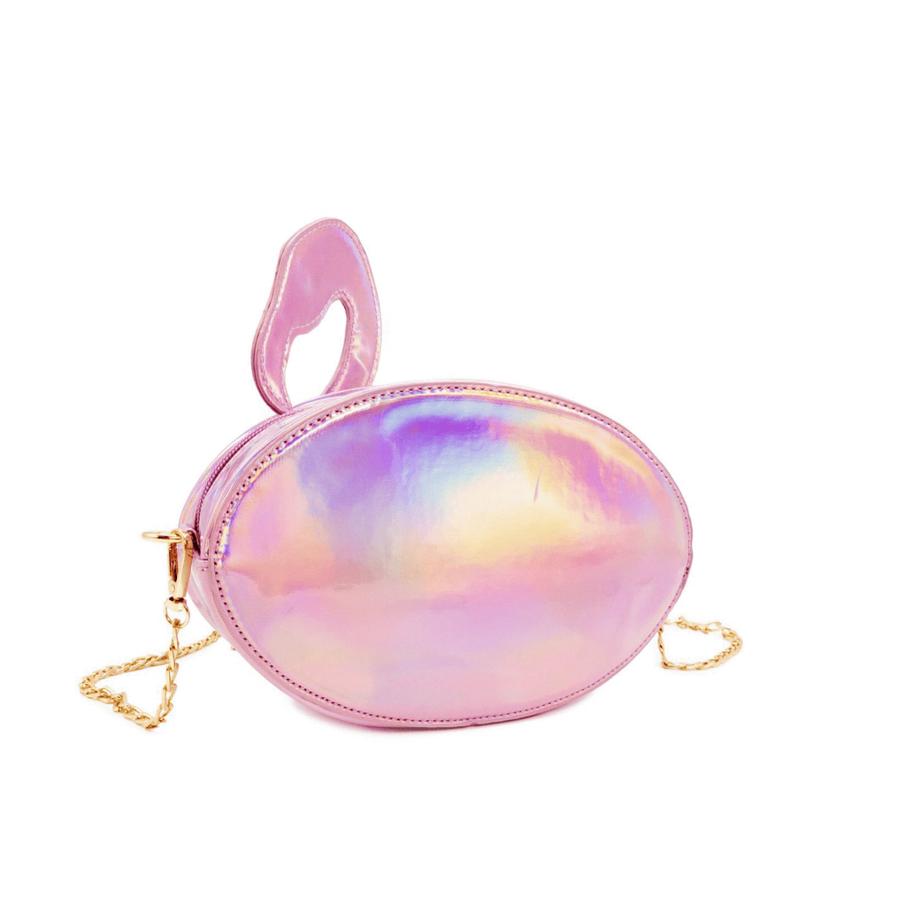 Novelty purse that is shaped like a pink iridescent flamingo pool floaty. Features a gold chain and zipper. From Bewaltz.