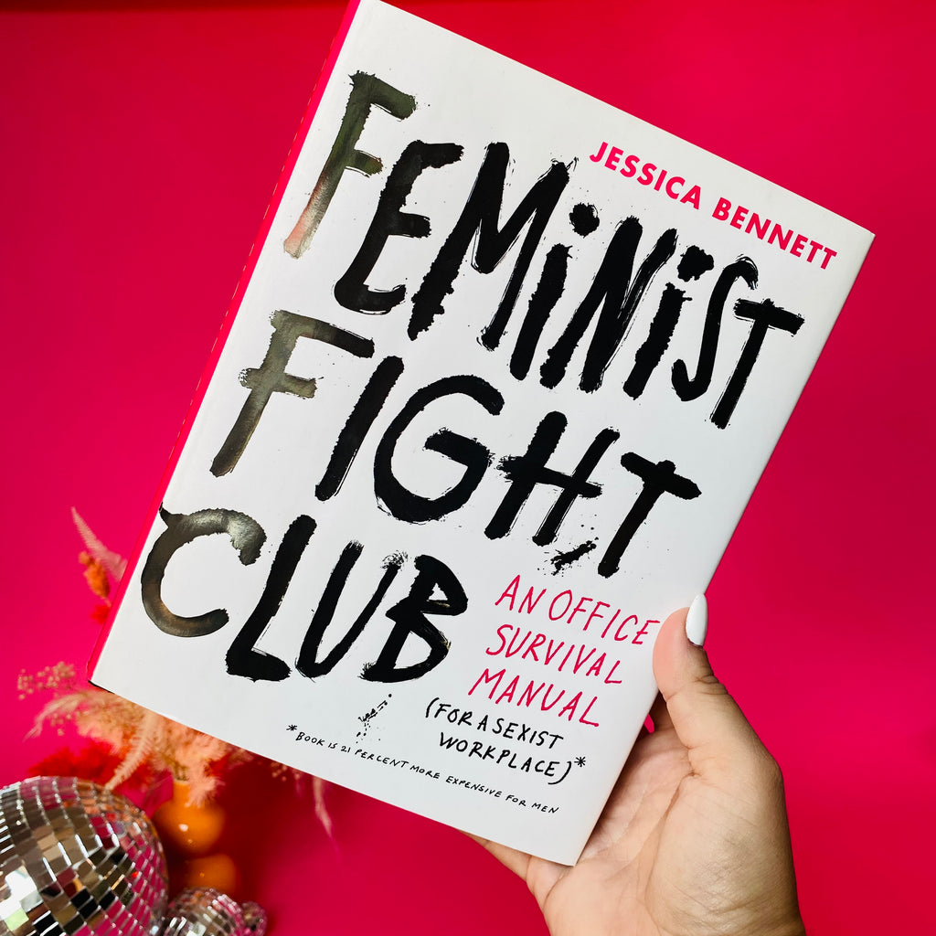 Feminist fight club: an office survival manual for a sexist work place book. Pink background and author jessica bennett